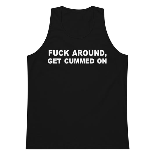 A black sleeveless tank top with bold white text on the chest reading 'FUCK AROUND, GET CUMMED ON', shown against a plain white background.