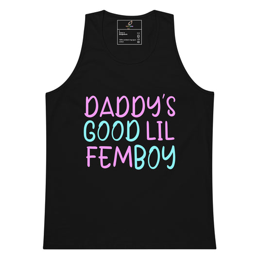 A black sleeveless tank top with the text 'DADDY'S GOOD LIL FEMBOY' printed on the front in pink and light blue lettering, shown against a plain white background.