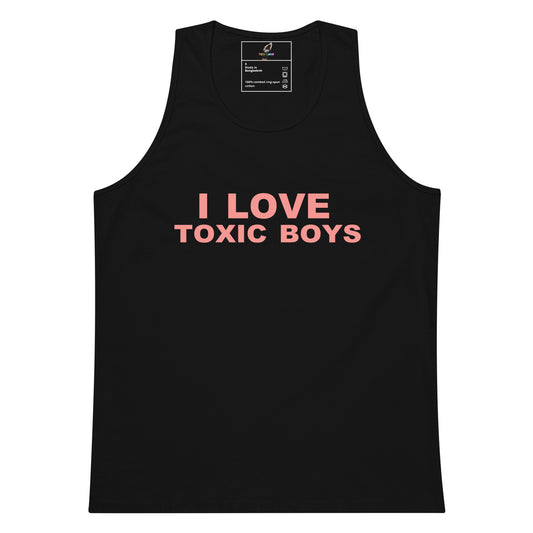A black sleeveless tank top with the text 'I LOVE TOXIC BOYS' printed in pink across the chest, shown on a plain white background.