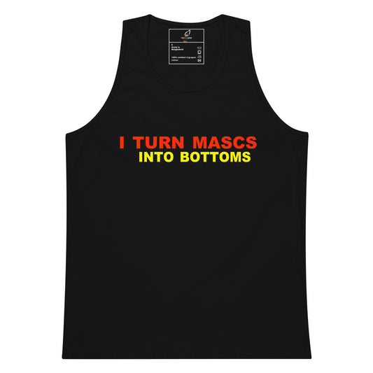 A black sleeveless tank top with the text 'I TURN MASCDS INTO BOTTOMS' printed on the chest in red and yellow, shown against a plain white background.