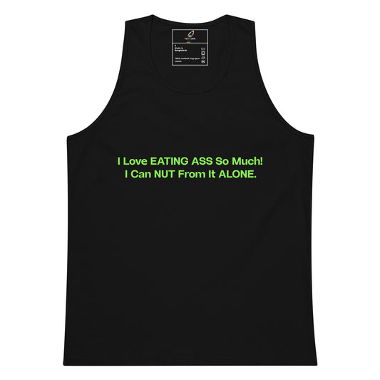 A black sleeveless tank top with bright green text on the chest that reads, 'I Love EATING ASS So Much! I Can NUT From It ALONE.' The tank top is shown flat against a plain white background, with a small interior neck label visible.