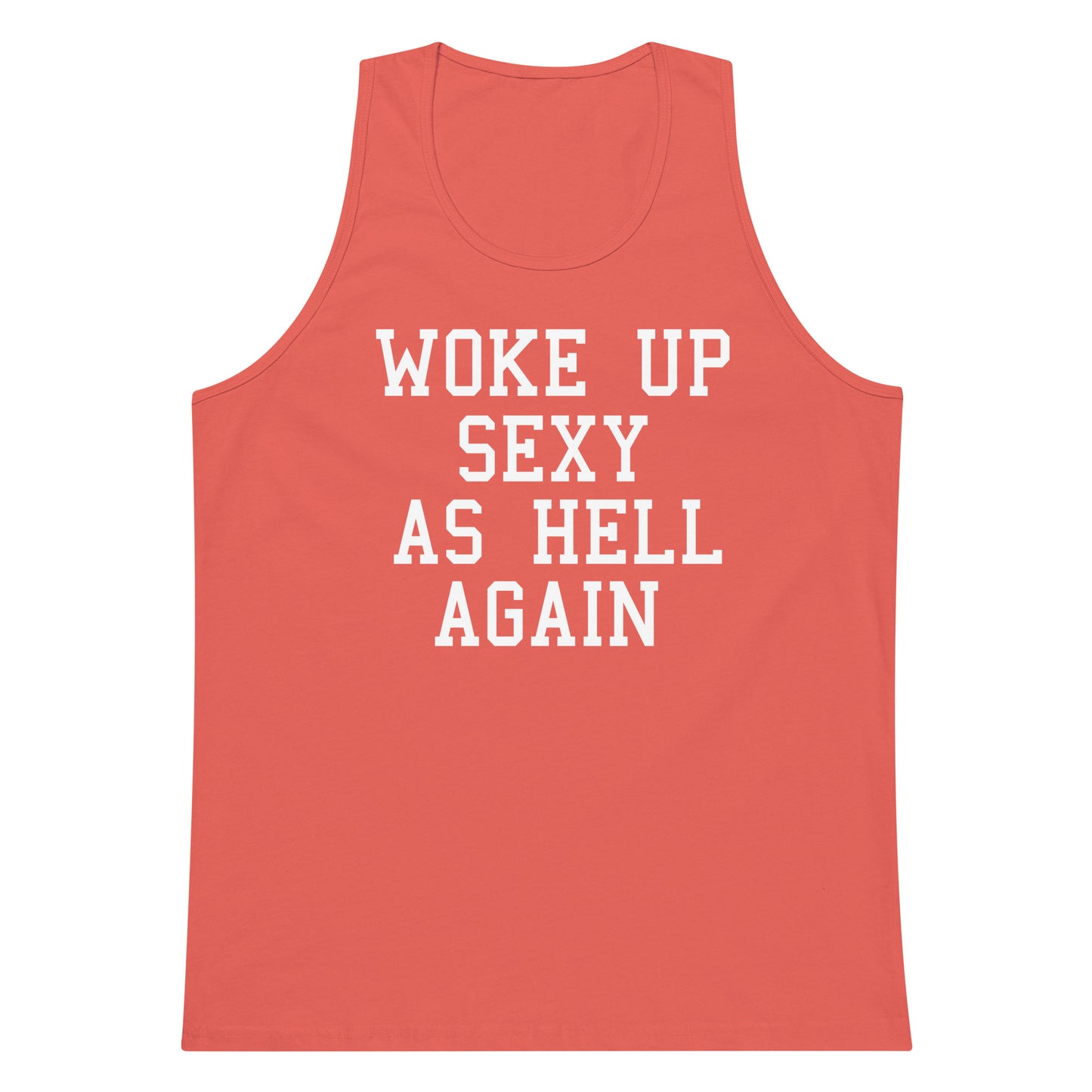 A coral pink tank top with bold white text reading 'WOKE UP SEXY AS HELL AGAIN' printed on the front, shown against a plain white background.