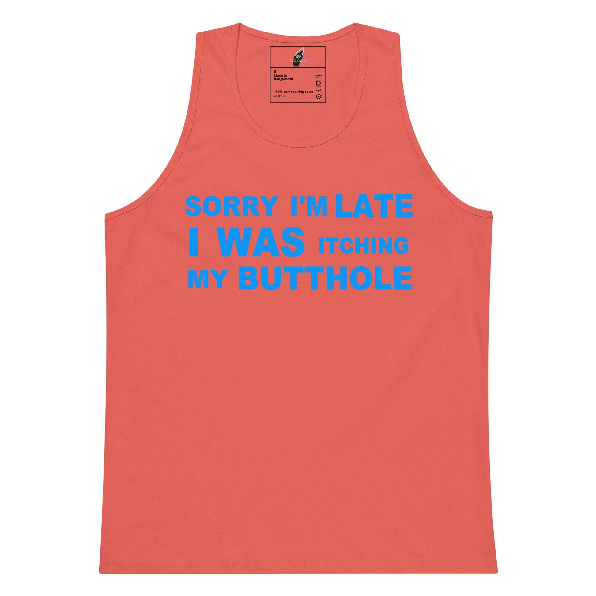A coral pink sleeveless tank top with bold blue text on the front reading 'SORRY I'M LATE I WAS ITCHING MY BUTTHOLE', shown flat against a white background.