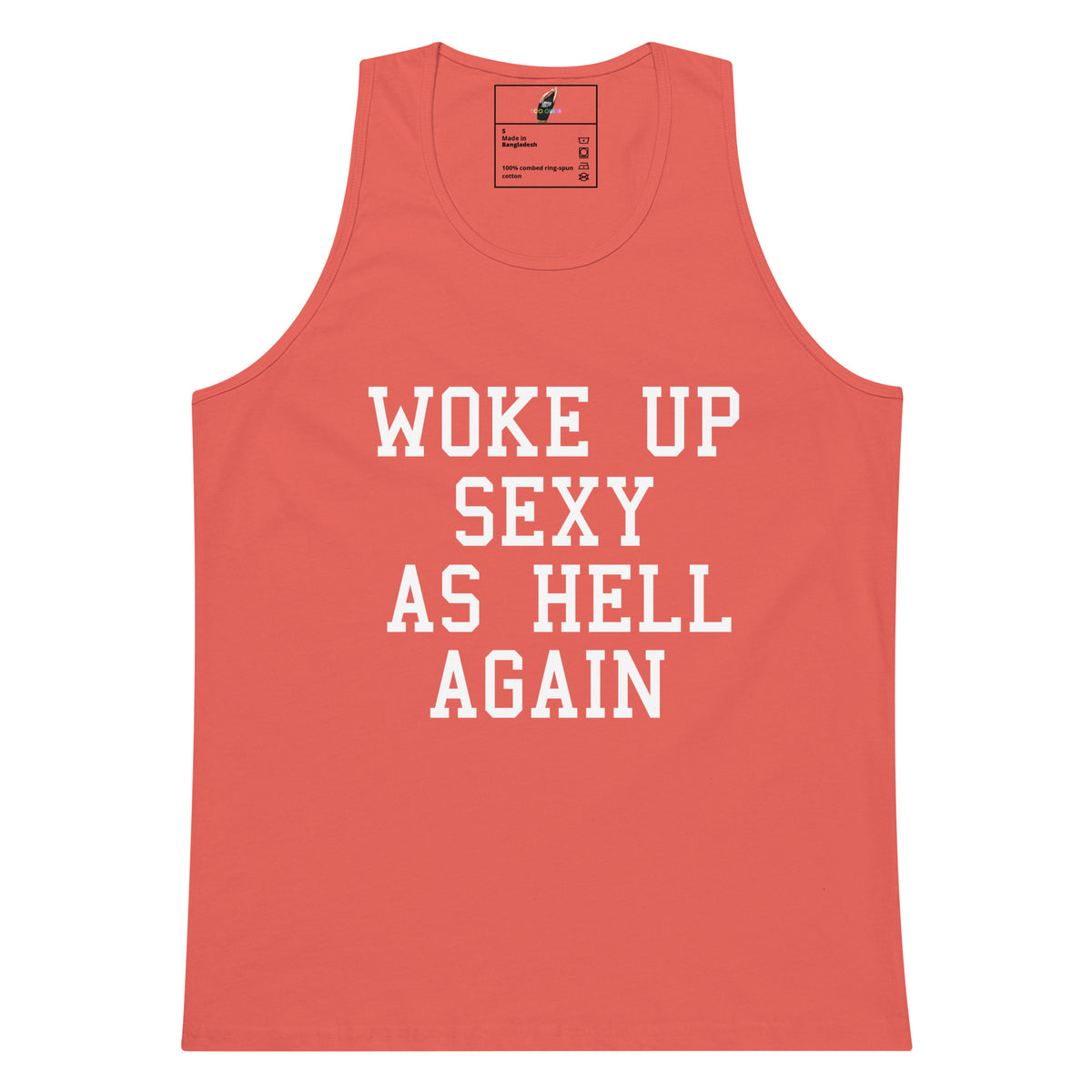 A coral pink sleeveless tank top with bold white text reading 'WOKE UP SEXY AS HELL AGAIN' printed on the front, shown against a plain white background.