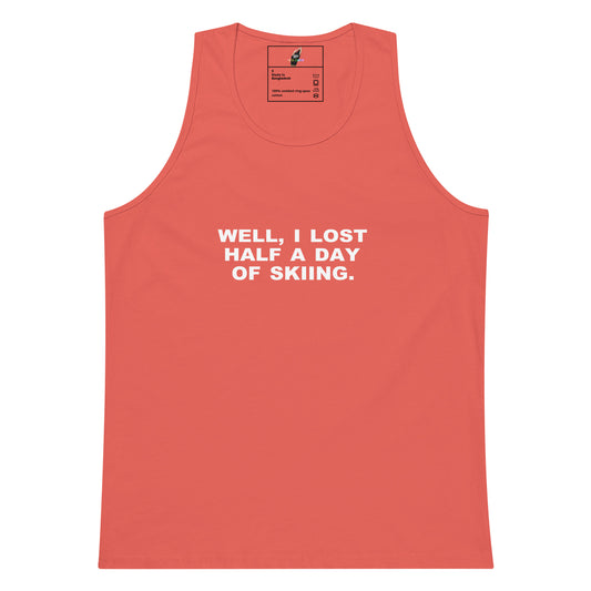 A coral pink sleeveless tank top with white text on the chest that reads 'WELL, I LOST HALF A DAY OF SKIING.' on a plain white background.