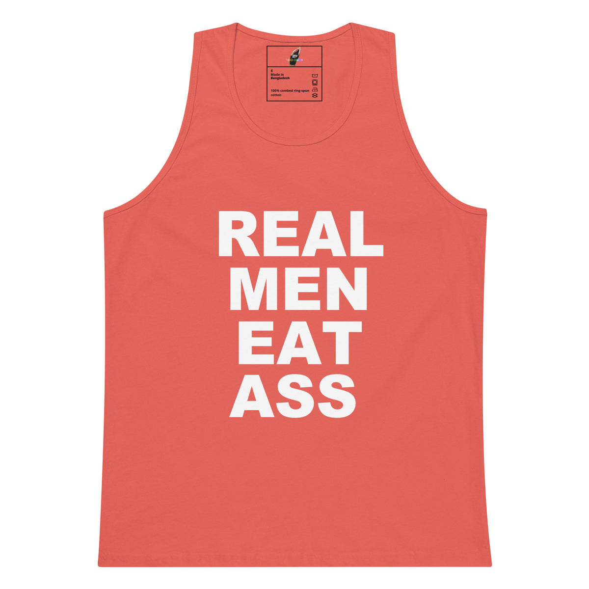 A coral pink tank top with bold white text reading 'REAL MEN EAT ASS' printed on the front, shown against a plain white background.