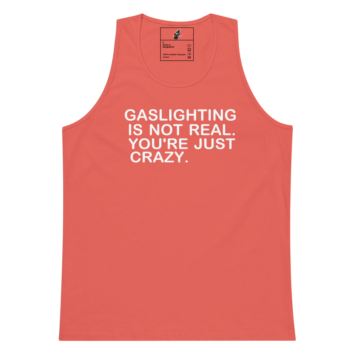 A coral pink tank top with bold white text reading 'GASLIGHTING IS NOT REAL. YOU'RE JUST CRAZY.