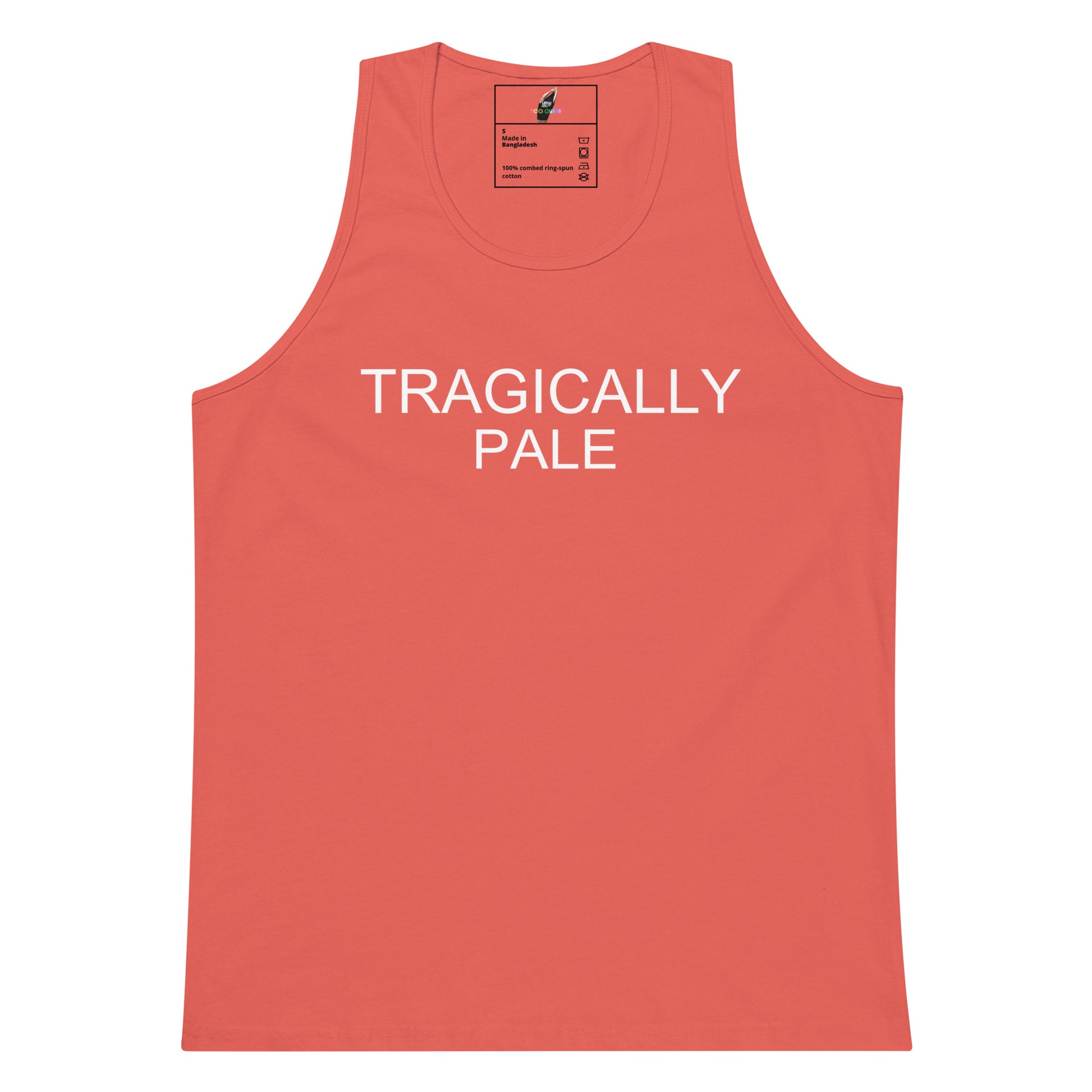 A coral pink tank top with the words 'TRAGICALLY PALE' printed in white across the chest, displayed flat against a solid white background.