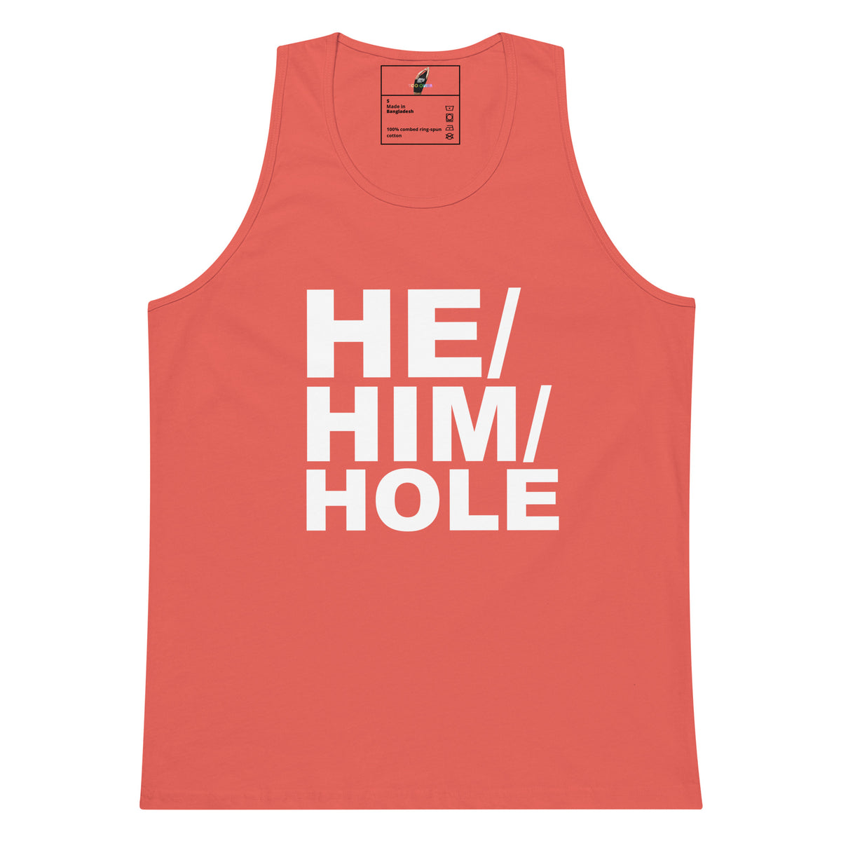 A coral pink tank top with the words 'HE/HIM/HOLE' printed in bold white capital letters on the front, displayed flat against a solid white background.