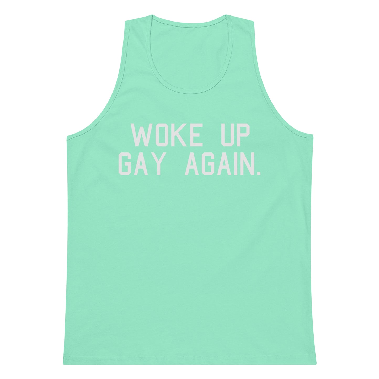 A mint green tank top with the phrase 'WOKE UP GAY AGAIN.' printed in white block letters across the chest, displayed on a solid white background.