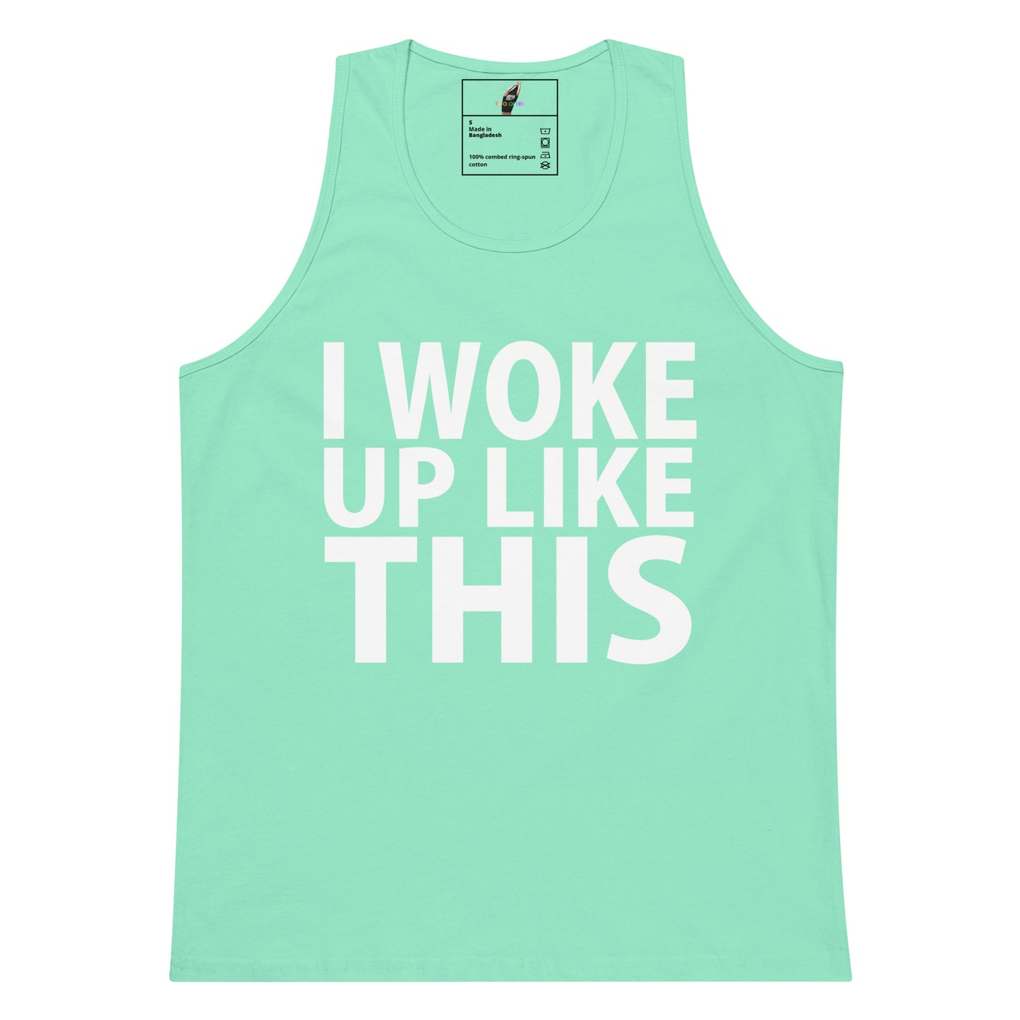 A mint green tank top with the phrase 'I WOKE UP LIKE THIS' printed in bold white capital letters on the front, displayed against a solid white background.