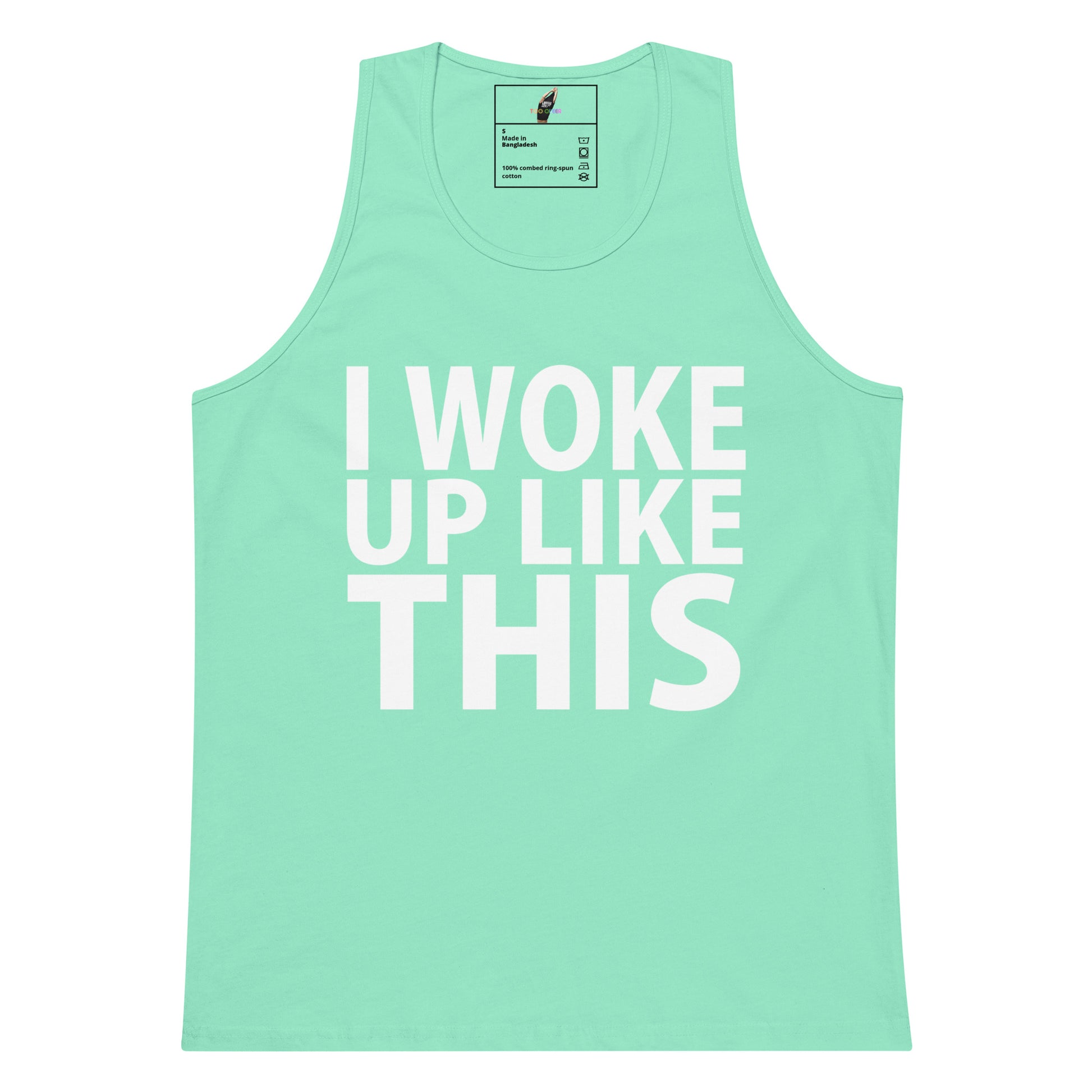 A mint green tank top with the phrase 'I WOKE UP LIKE THIS' printed in bold white capital letters on the front, displayed against a solid white background.