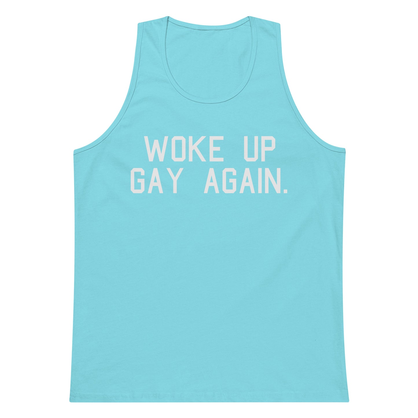 A light blue tank top with the phrase 'WOKE UP GAY AGAIN.' printed in white block letters across the chest, displayed on a solid white background.
