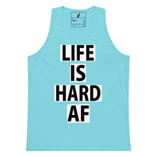 A light blue tank top with the text 'LIFE IS HARD AF' printed in bold black letters on a white background, displayed flat against a white backdrop.