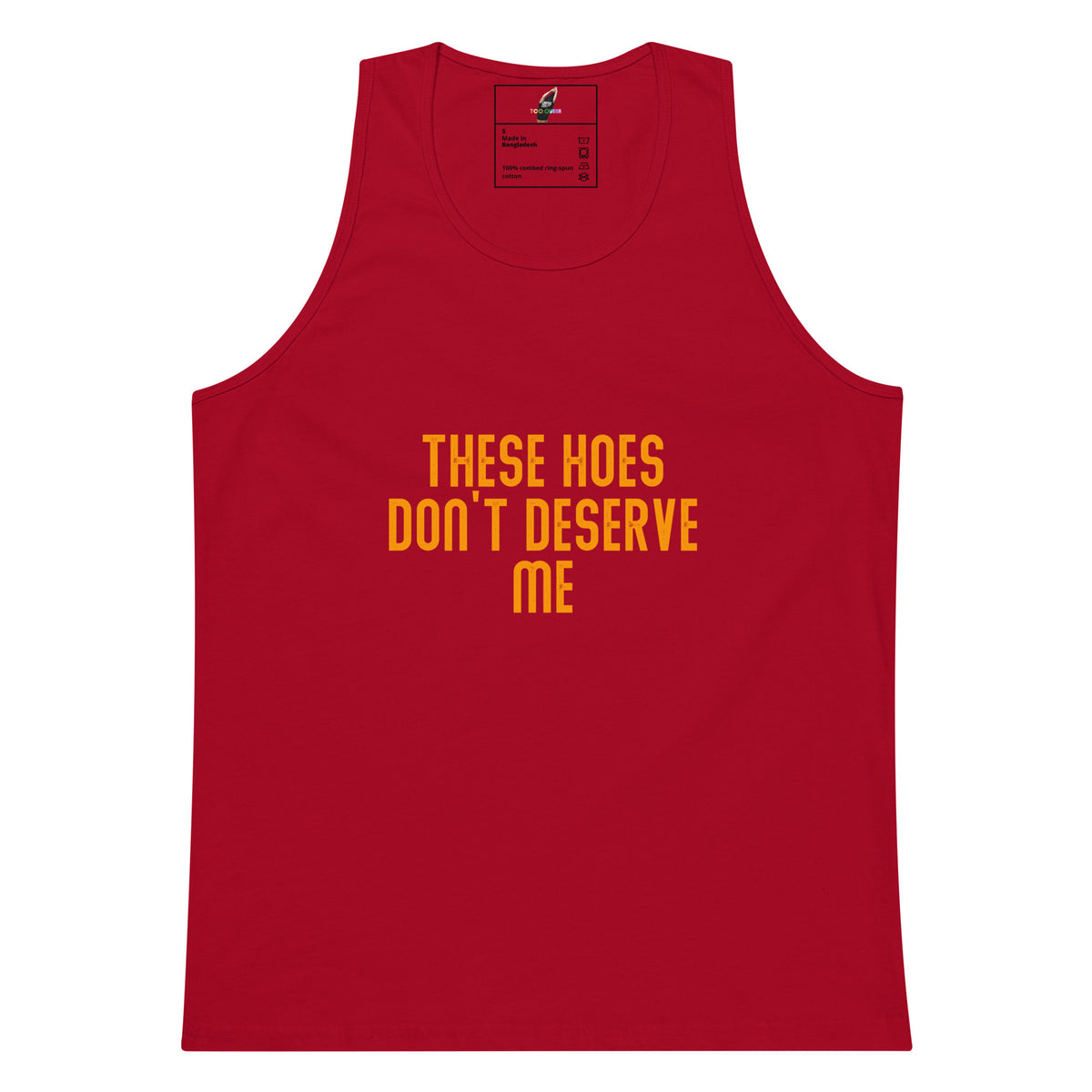 A red sleeveless tank top with the text 'THESE HOES DON'T DESERVE ME' printed in yellow across the chest, shown on a plain white background.