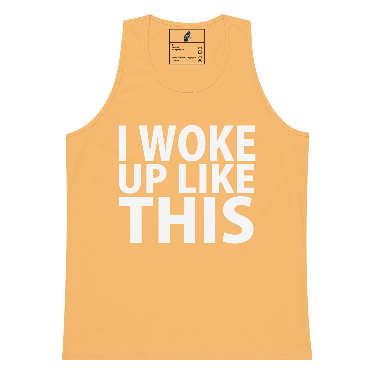 A sleeveless tank top in a warm peach-orange color with the phrase 'I WOKE UP LIKE THIS' printed in large white block letters across the front, shown on a plain white background.