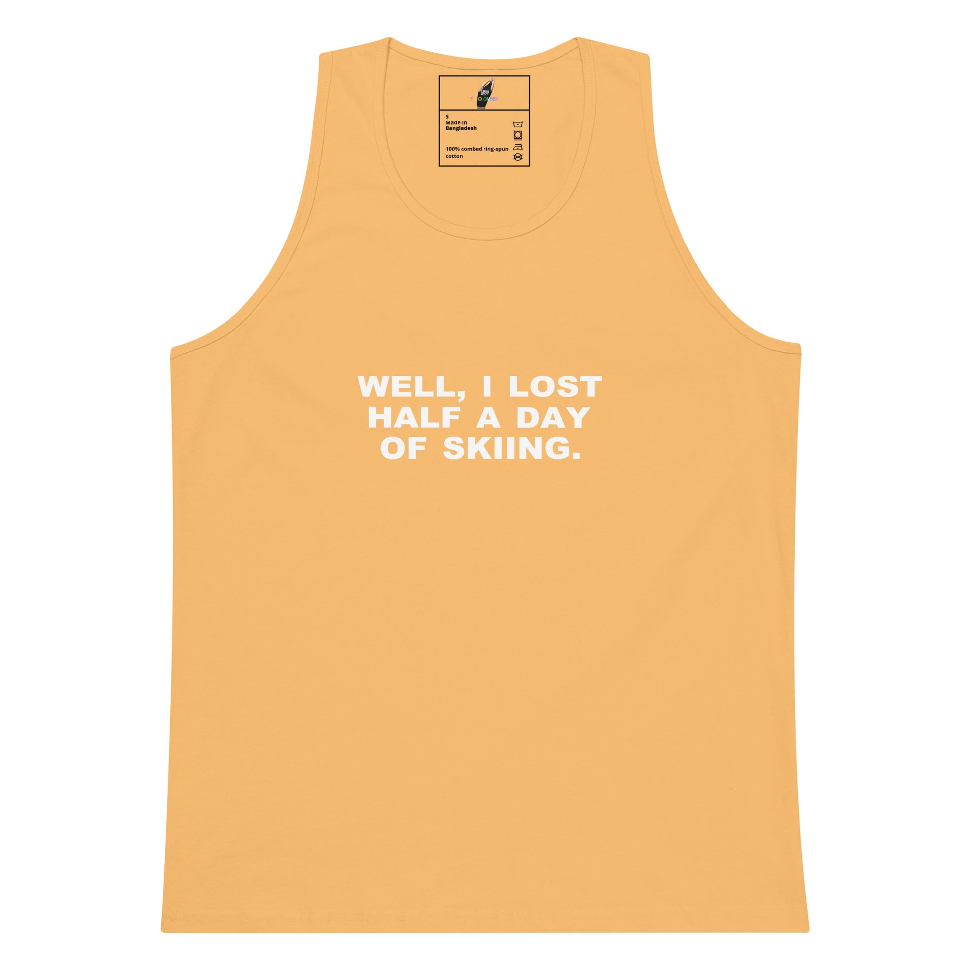 A light orange-yellow tank top with white text reading 'WELL, I LOST HALF A DAY OF SKIING.' on the chest, shown flat against a white background.