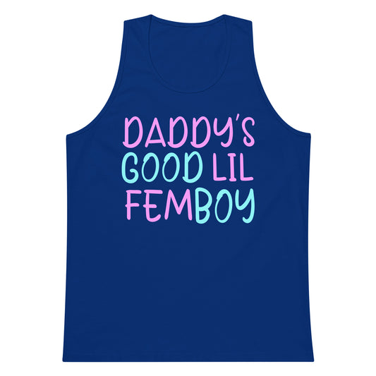 A navy blue sleeveless tank top with the text 'DADDY'S GOOD LIL FEMBOY' printed on the front in pink and light blue lettering, shown against a plain white background.