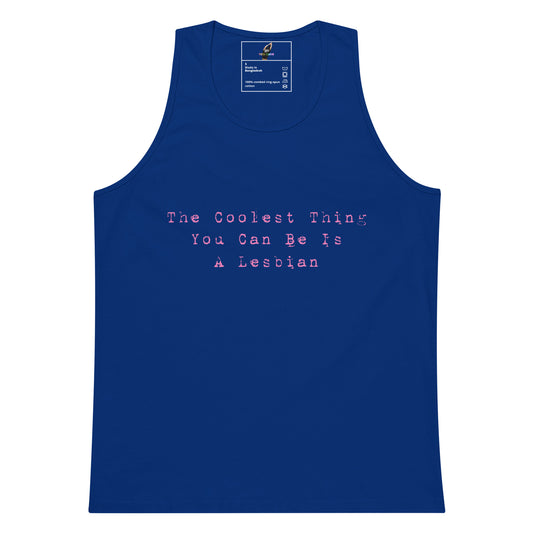 A royal blue sleeveless tank top with pink text on the chest reading 'The Coolest Thing You Can Be Is A Lesbian'. The tank top is displayed flat against a solid white background, with a brand label visible inside the collar.