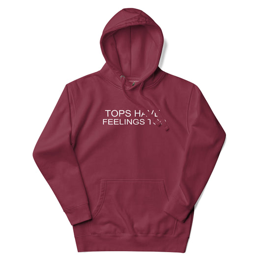 A maroon pullover hoodie with a white graphic text print reading 'TOPS HAVE FEELINGS TOO' across the chest, displayed on a clean white background.