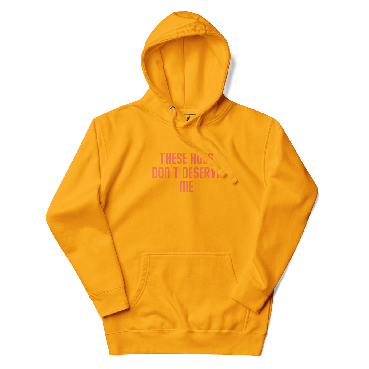A bright yellow pullover hoodie with a pink graphic text print on the chest reading 'THESE MGS DON'T DESERT.