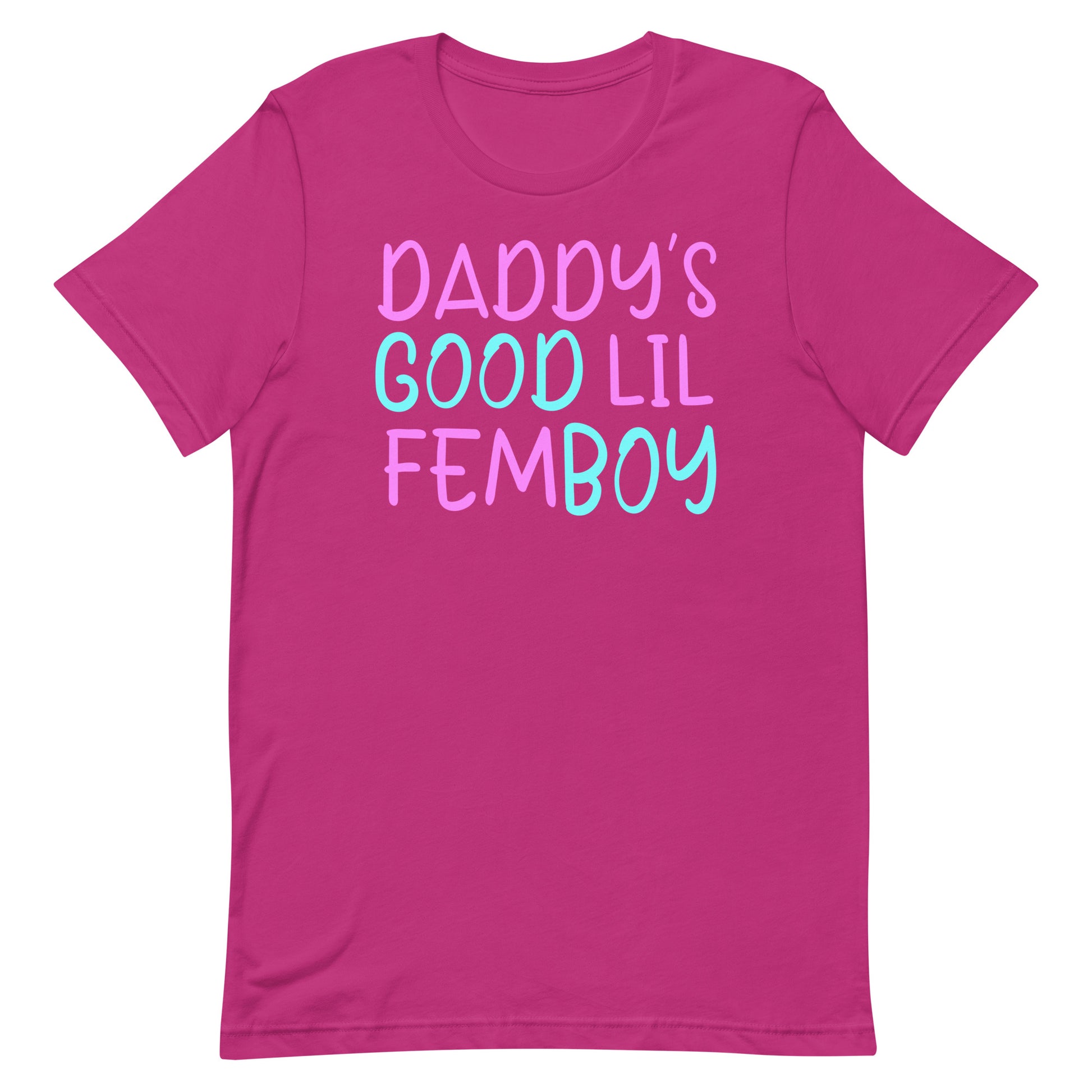 A bright pink short-sleeve t-shirt with the text 'DADDY'S GOOD LIL FEMBOY' printed on the chest in a pastel pink and light blue cursive font, shown against a plain white background.