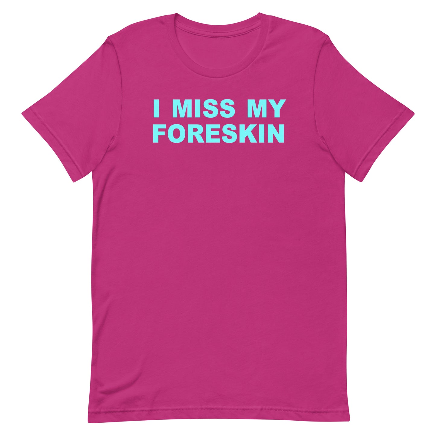 A bright pink short-sleeve crewneck t-shirt with the text 'I MISS MY FORESKIN' printed in light blue across the chest, displayed on a solid white background.