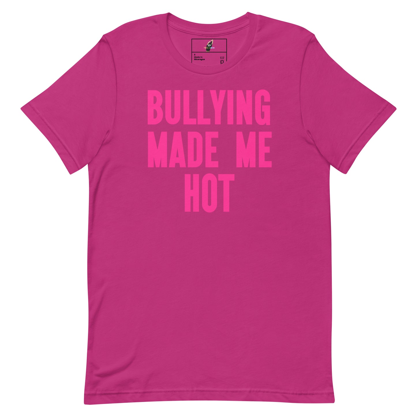 A bright pink short-sleeve t-shirt with the phrase 'BULLYING MADE ME HOT' printed in a slightly darker pink block font across the chest, shown on a plain white background.