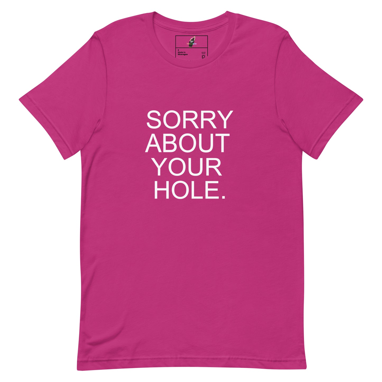 A bright pink short-sleeve t-shirt with the phrase 'SORRY ABOUT YOUR HOLE.' printed in bold white capital letters on the front, displayed flat against a solid white background.