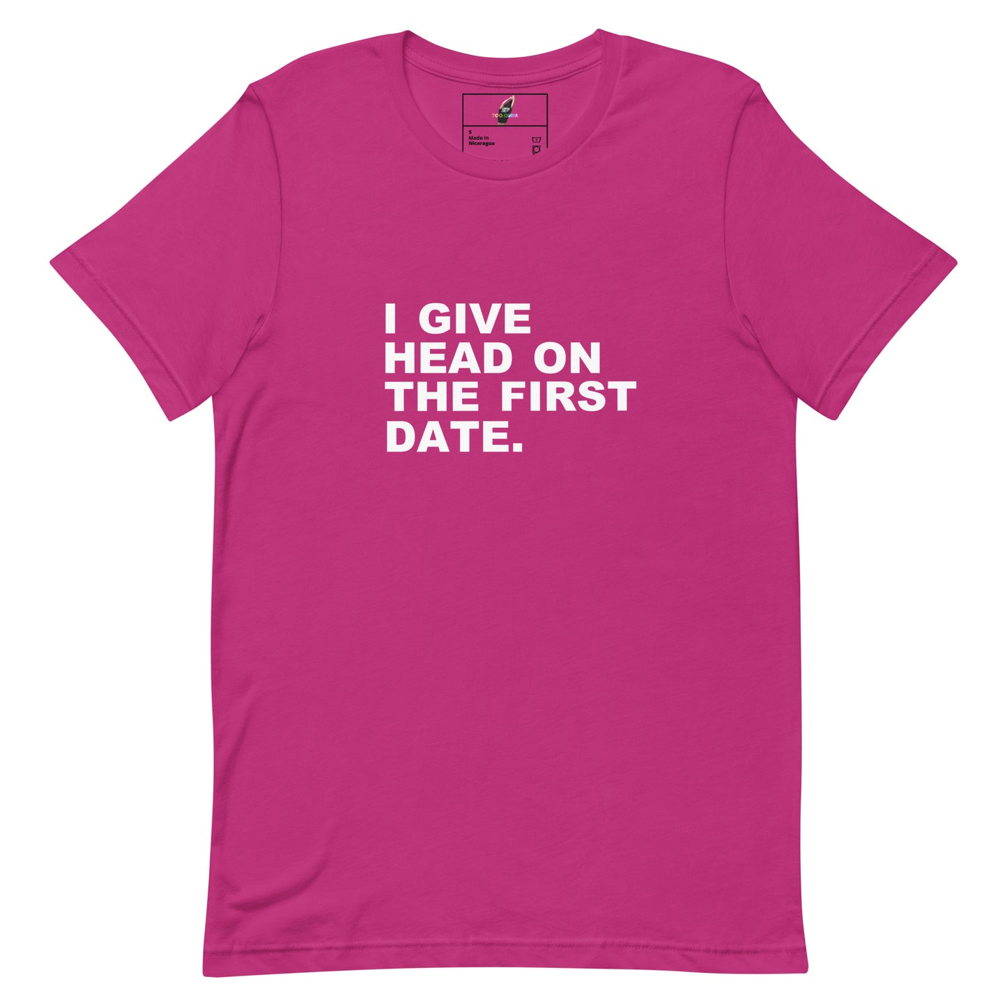 A bright pink short-sleeve crewneck t-shirt with bold white text on the chest that reads 'I GIVE HEAD ON THE FIRST DATE.'