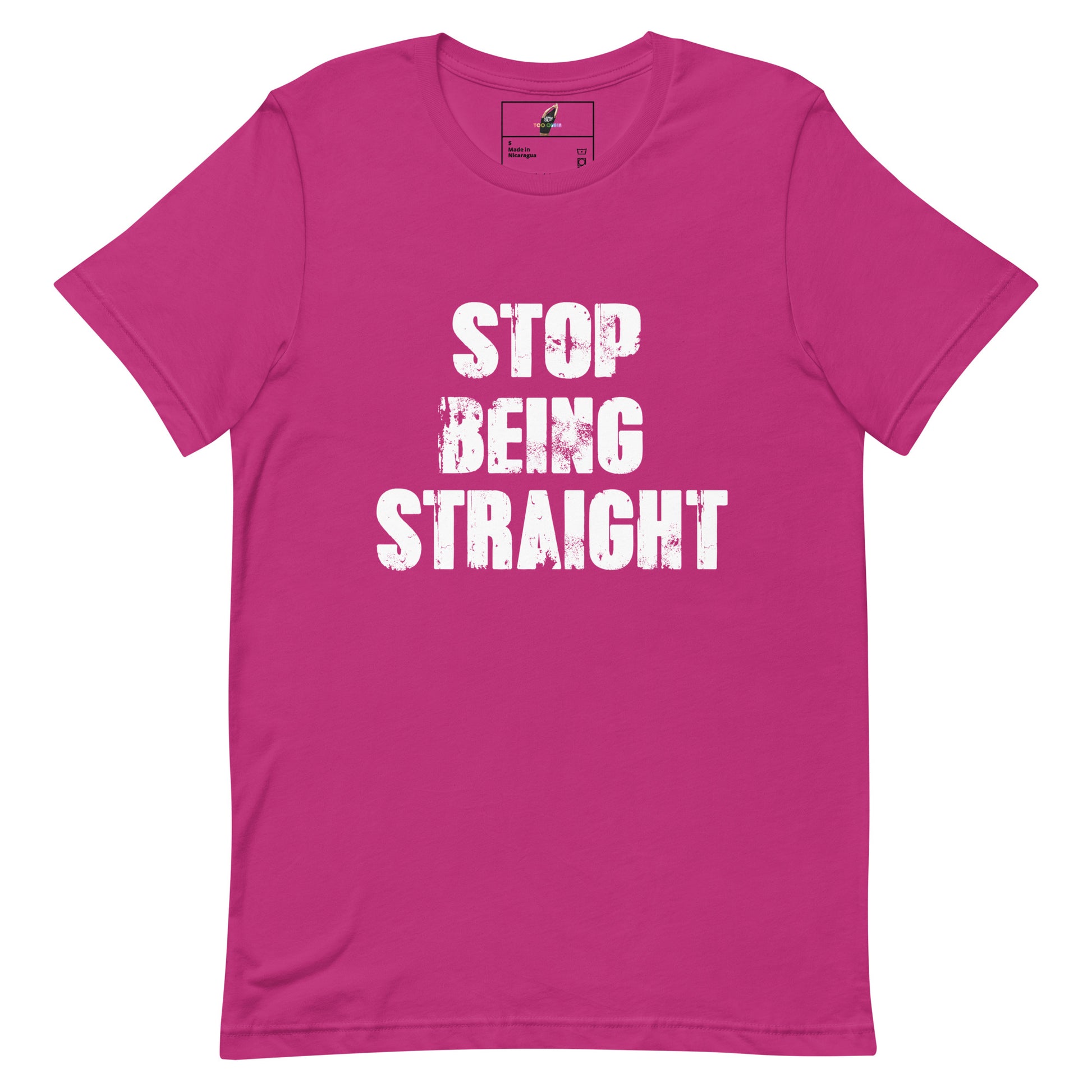 A bright pink short-sleeve t-shirt with the phrase 'STOP BEING STRAIGHT' printed in distressed white block letters across the chest, displayed on a clean white background.