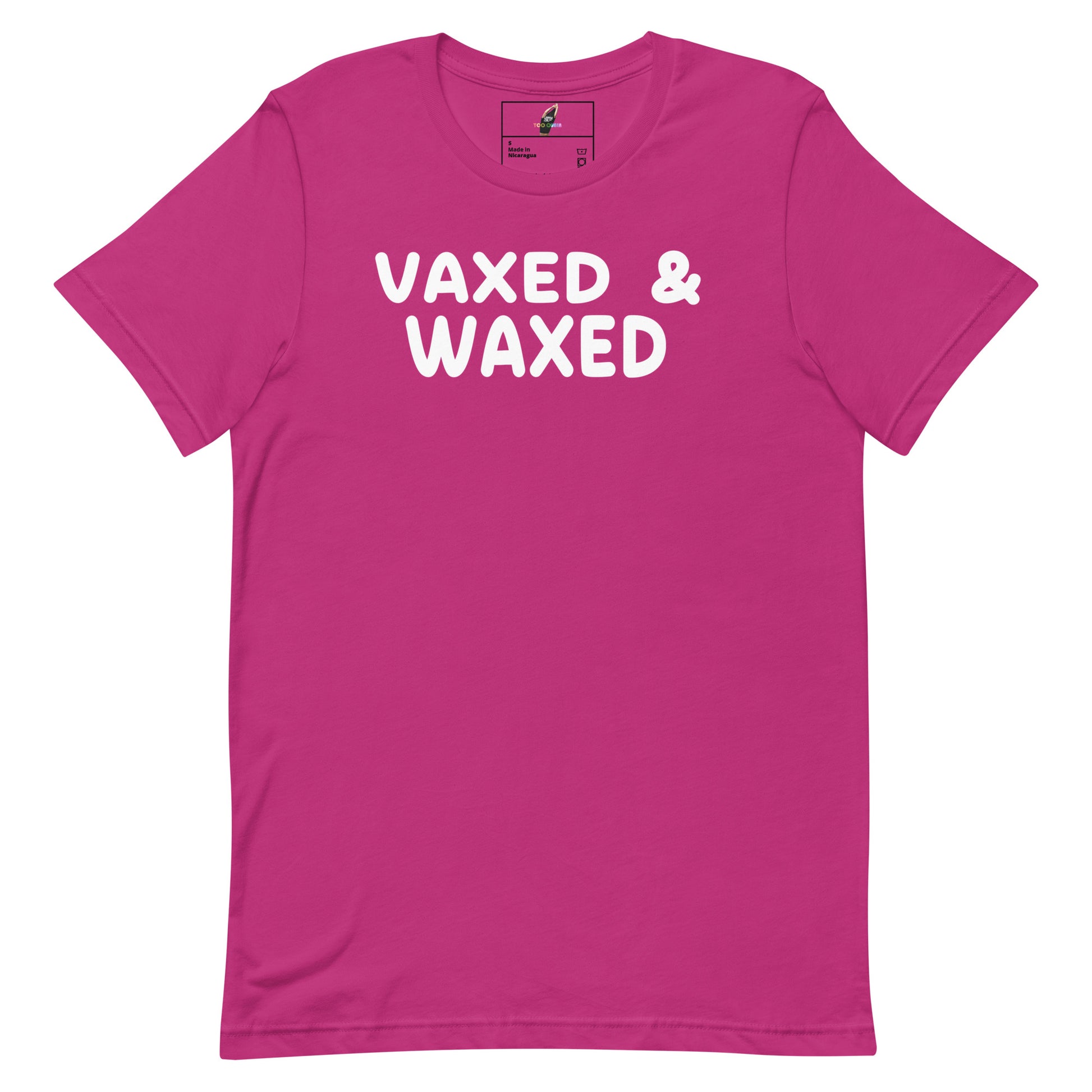 A bright pink short-sleeve crewneck t-shirt with the words 'VAXED & WAXED' printed in bold white capital letters across the chest, displayed flat against a solid white background.