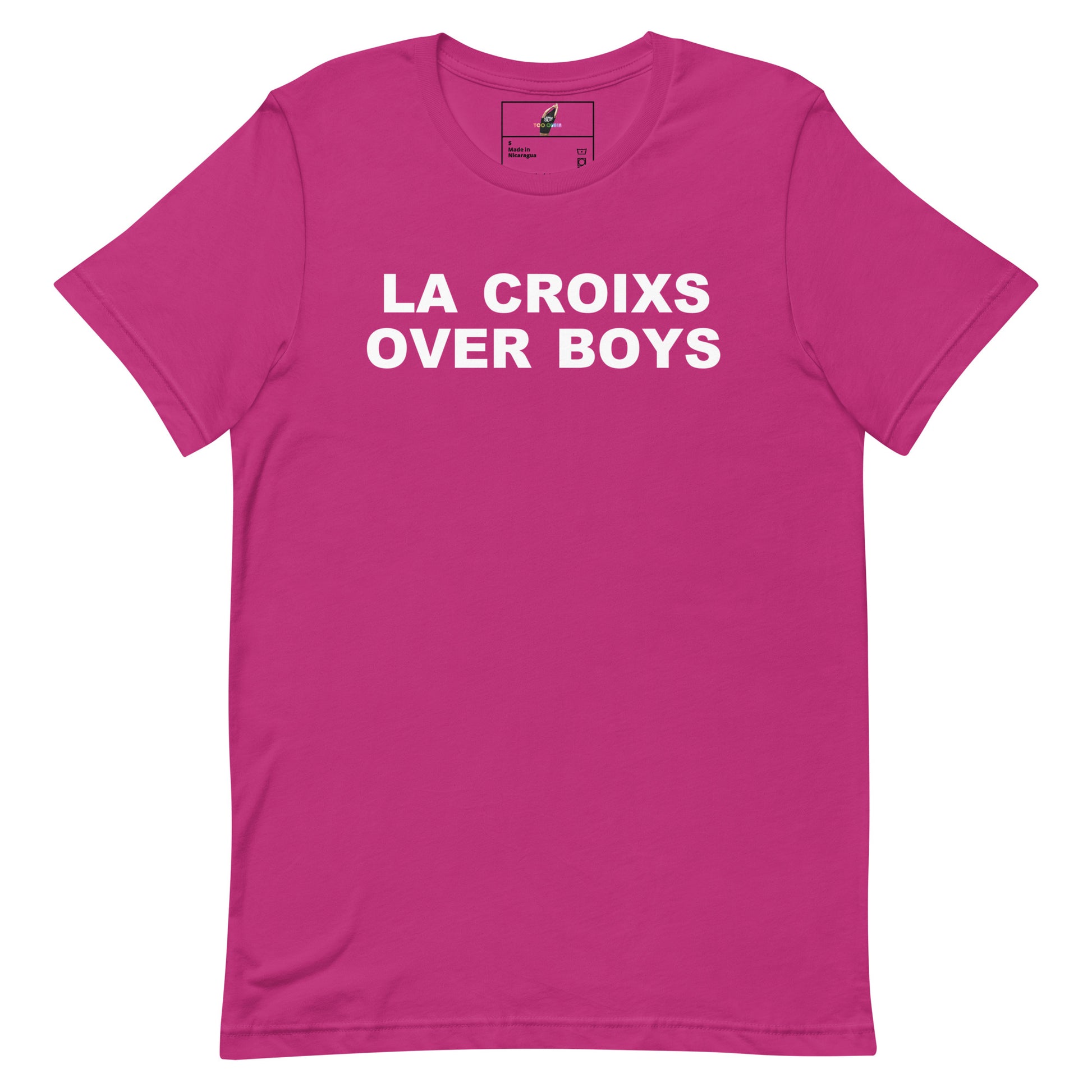 A bright pink short-sleeve crewneck t-shirt with the phrase 'LA CROIXS OVER BOYS' printed in bold white capital letters across the chest, displayed on a clean white background.