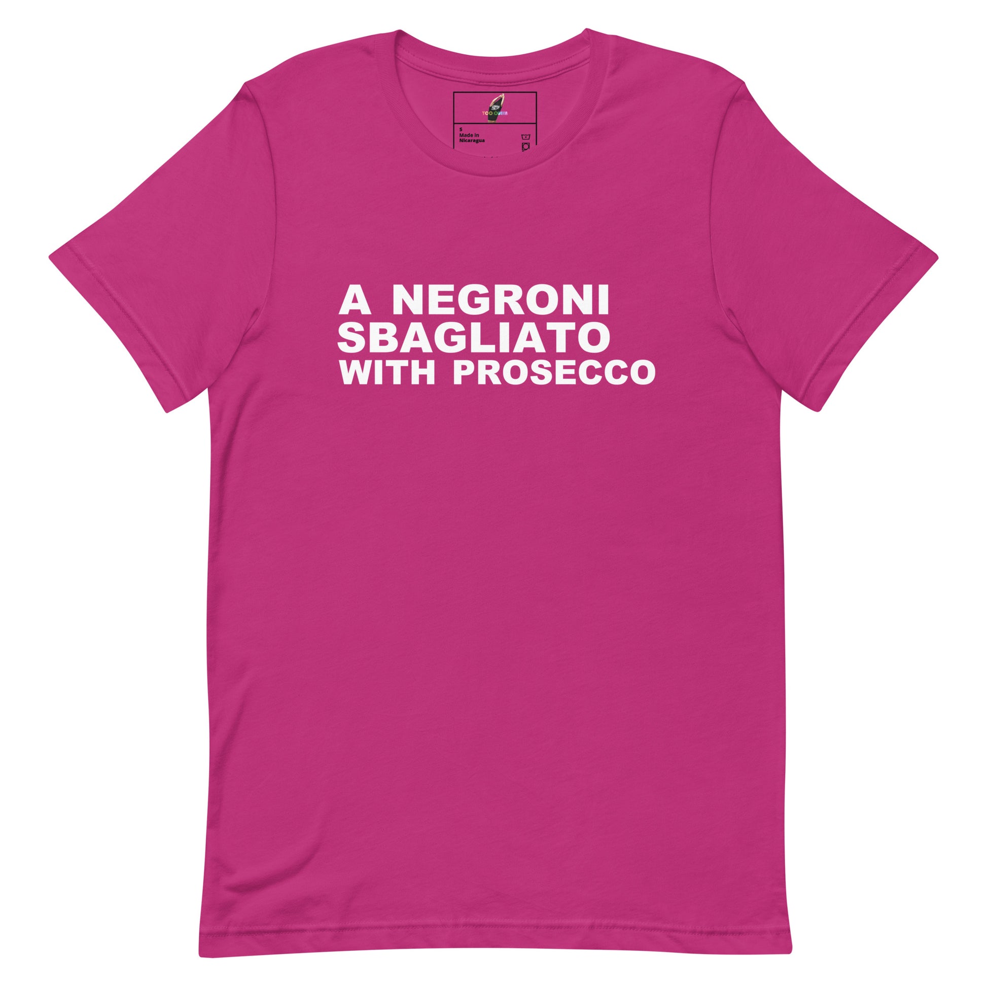 A bright pink short-sleeve crewneck t-shirt with bold white text on the chest reading 'A NEGRONI SBAGLIATO WITH PROSECCO'.