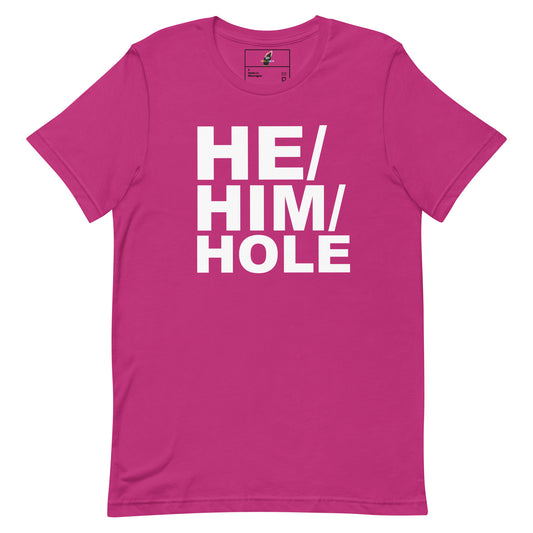 A bright pink short-sleeve t-shirt with the phrase 'HE/HIM/HOLE' printed in large, bold white block letters across the chest, displayed on a clean white background.