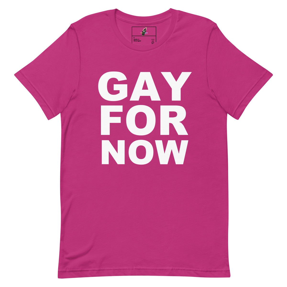 A bright pink short-sleeve t-shirt with the words 'GAY FOR NOW' printed in large, bold white capital letters across the front, displayed on a clean white background.