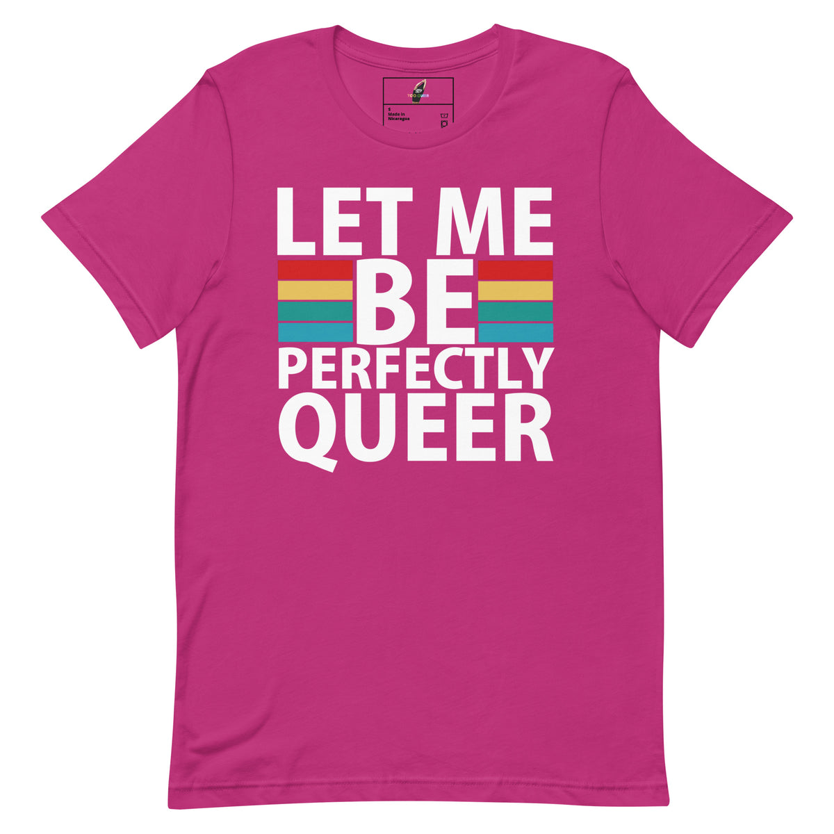 A bright pink short-sleeve t-shirt with a graphic on the front that reads 'LET ME BE PERFECTLY QUEER' in bold white letters, with a rainbow stripe graphic behind the word 'BE'.
