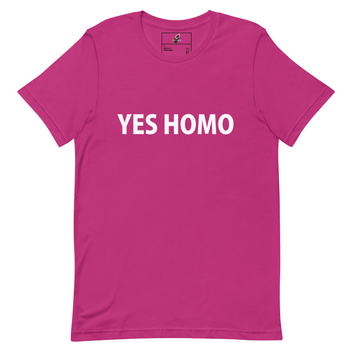 A bright pink short-sleeve crewneck t-shirt with the words 'YES HOMO' printed in bold white capital letters across the chest, displayed flat against a solid white background.