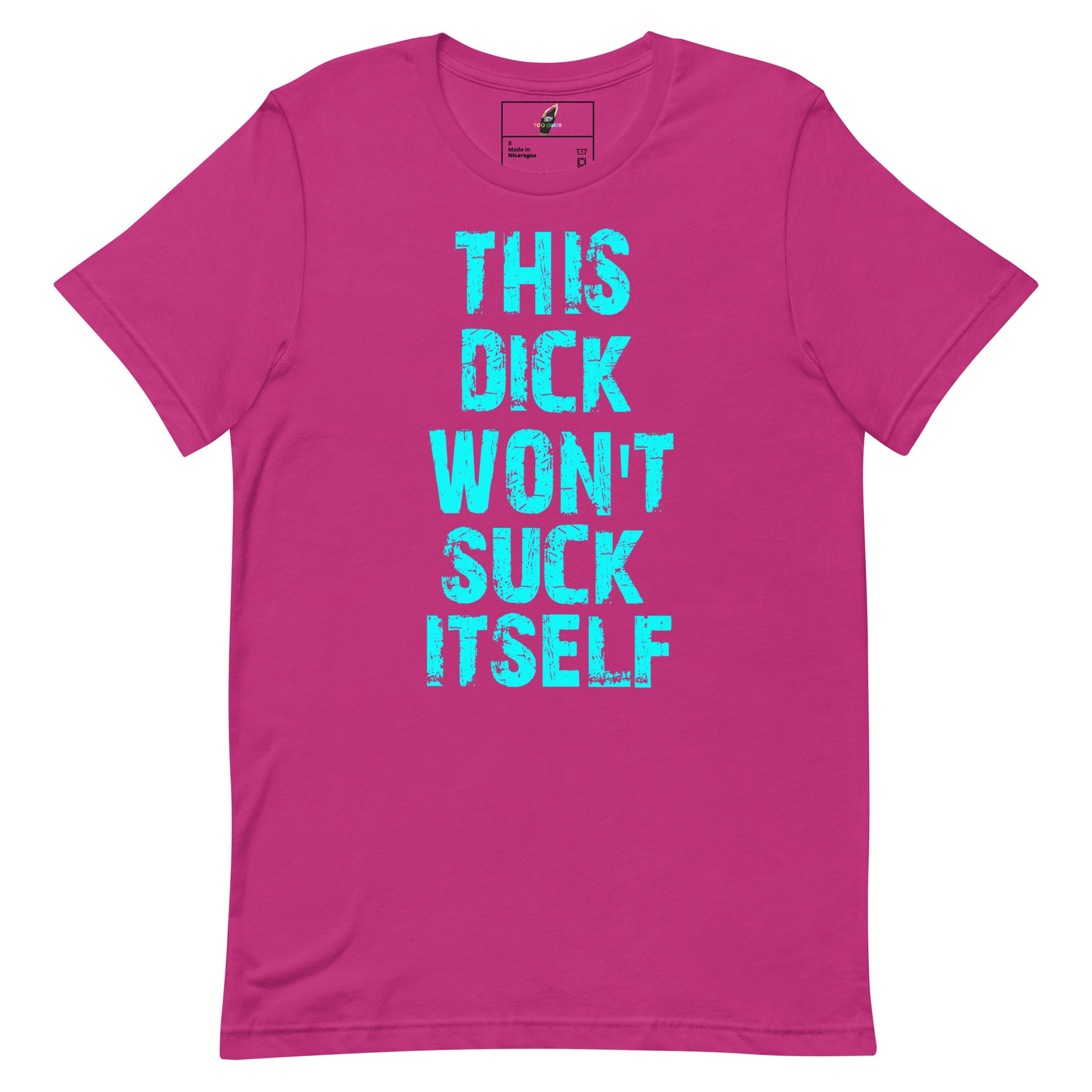 A bright pink short-sleeve t-shirt with the phrase 'THIS DICK WON'T SUCK ITSELF' printed vertically in a distressed turquoise font on the front.