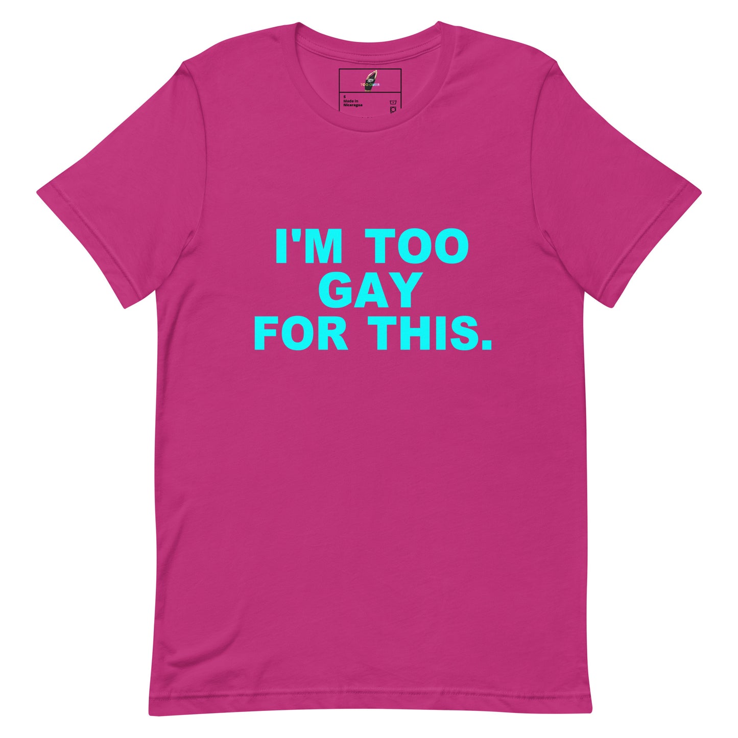 A bright pink short-sleeve t-shirt with the text 'I'M TOO GAY FOR THIS.' printed in bold cyan letters on the chest, displayed flat against a solid white background.