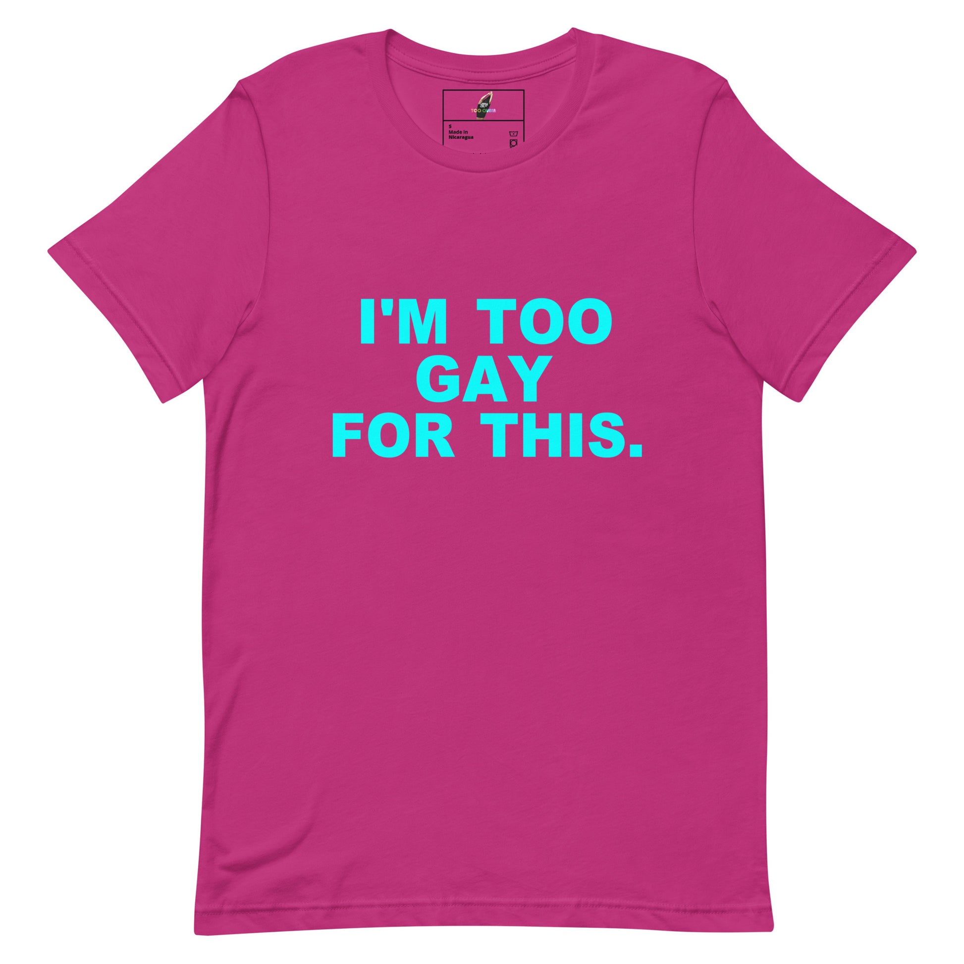 A bright pink short-sleeve t-shirt with the text 'I'M TOO GAY FOR THIS.' printed in bold cyan letters on the chest, displayed flat against a solid white background.