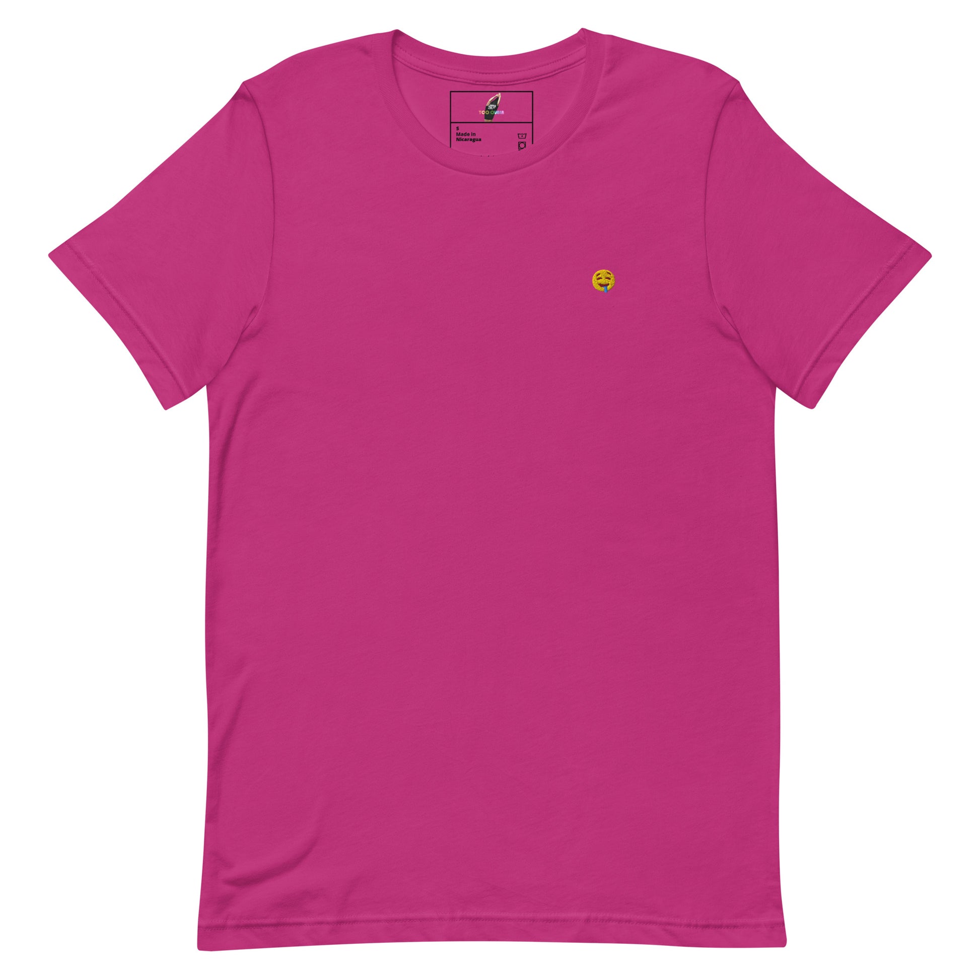 A bright pink short-sleeve crewneck t-shirt with a small yellow smiley face graphic on the left chest, displayed flat against a solid white background.