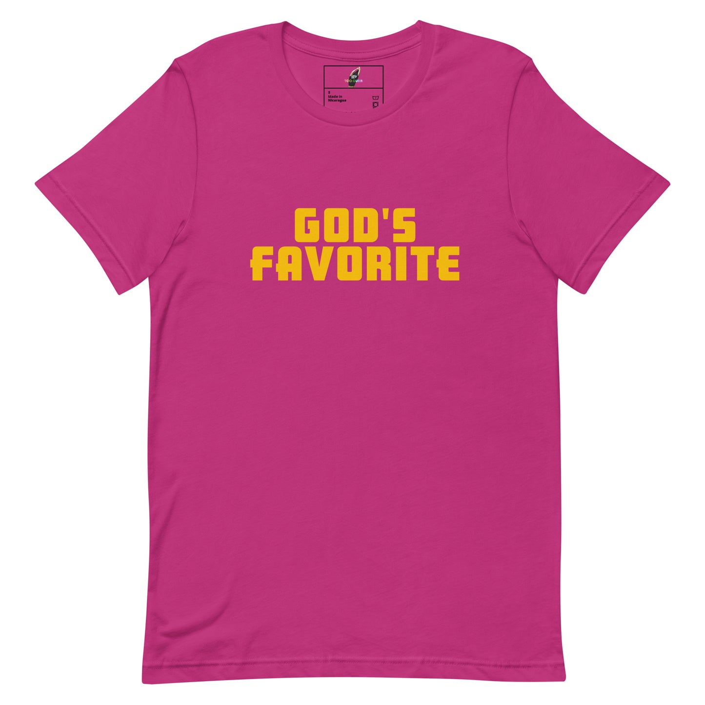 A bright pink short-sleeve t-shirt with the phrase 'GOD'S FAVORITE' printed across the chest in bold yellow block letters, displayed on a clean white background.