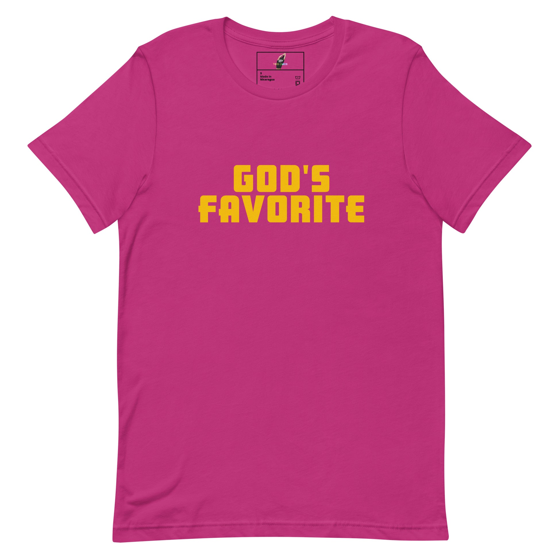 A bright pink short-sleeve t-shirt with the phrase 'GOD'S FAVORITE' printed across the chest in bold yellow block letters, displayed on a clean white background.