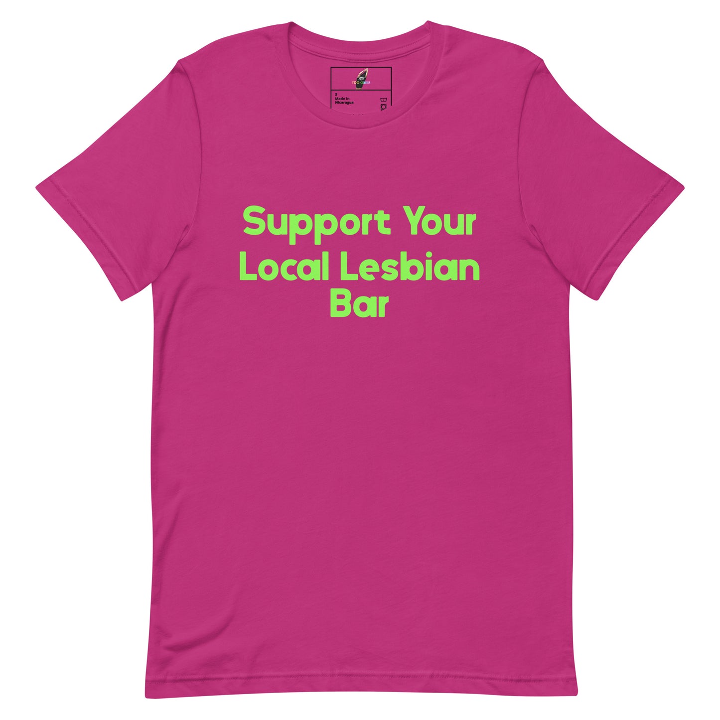 A bright pink short-sleeve crewneck t-shirt with the text 'Support Your Local Lesbian Bar' printed in a light green sans-serif font across the chest, displayed on a solid white background.