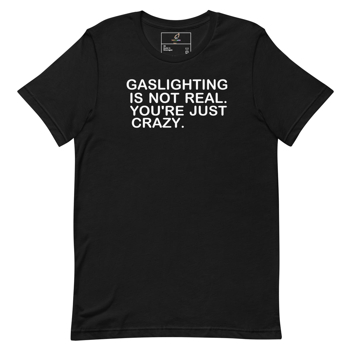 A black short-sleeve crewneck t-shirt with bold white text on the chest that reads 'GASLIGHTING IS NOT REAL. YOU'RE JUST CRAZY.