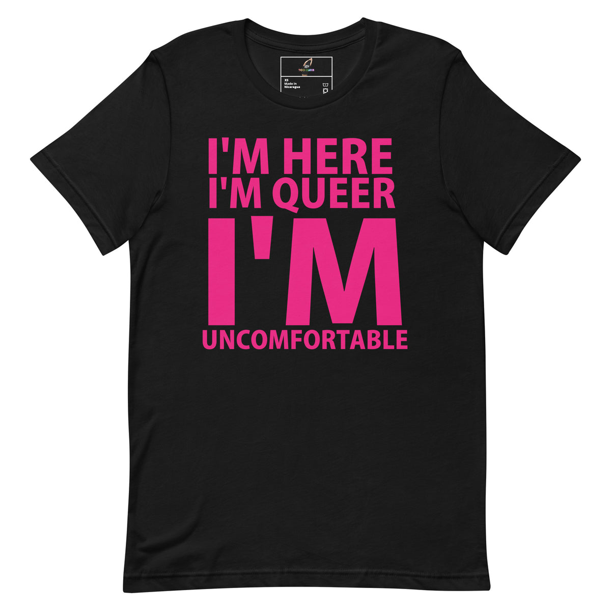 A black short-sleeve t-shirt with a bold pink text graphic on the front reading 'I'M HERE I'M QUEER I'M UNCOMFORTABLE'.