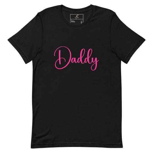 A black short-sleeve crewneck t-shirt featuring the word 'Daddy' printed across the chest in a bright pink cursive script, displayed on a clean white background.