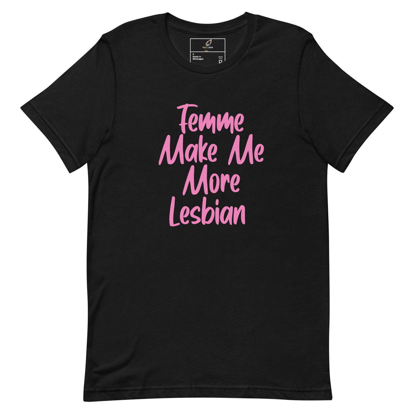 A black short-sleeve crewneck t-shirt with the phrase 'Femme Make Me More Lesbian' printed in pink script across the chest, displayed flat against a solid white background.