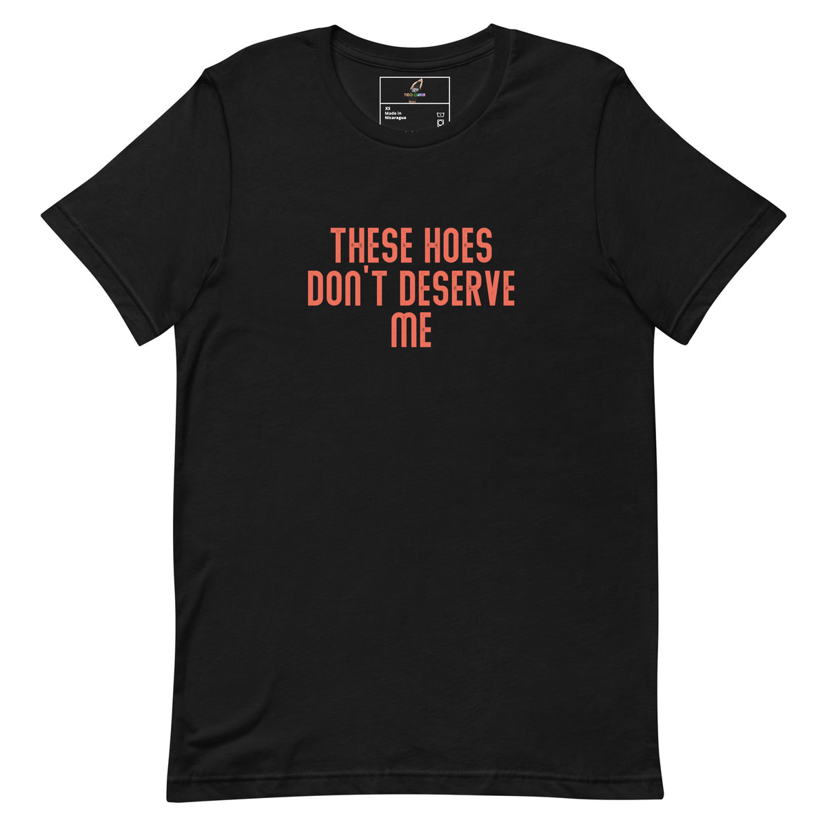 A black short-sleeve crewneck t-shirt with the text 'THESE HOES DON'T DESERVE ME' printed in orange across the chest, displayed on a solid white background.